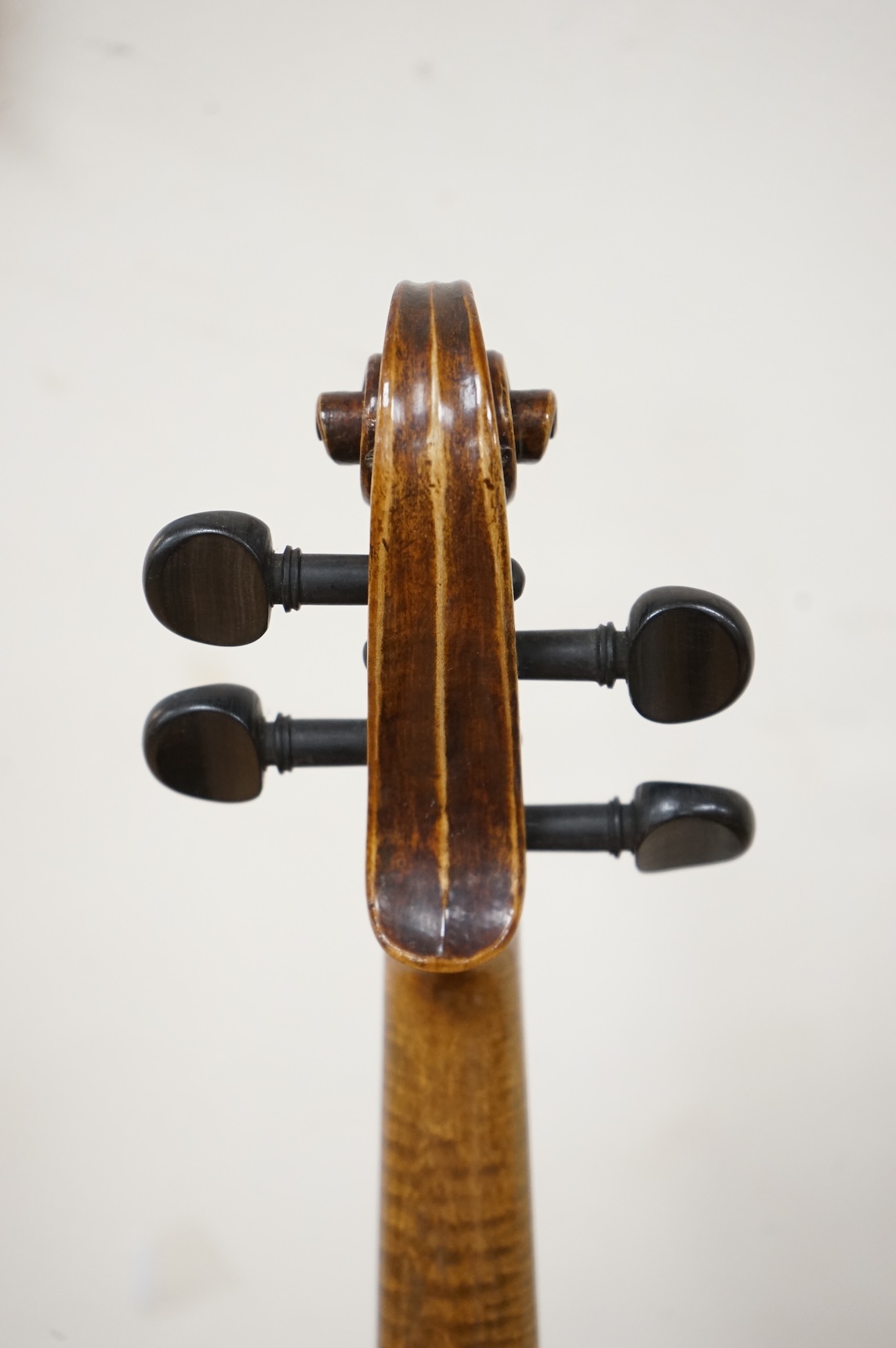 A late 19th century violin, with label for J.B. Schweitzer, 7/8 size, no bow, in case